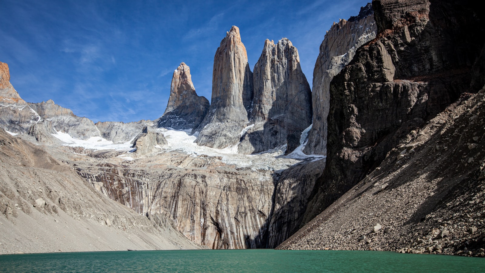 A lake below the rocky peaks of Torres del Paine National Park, Patagonia