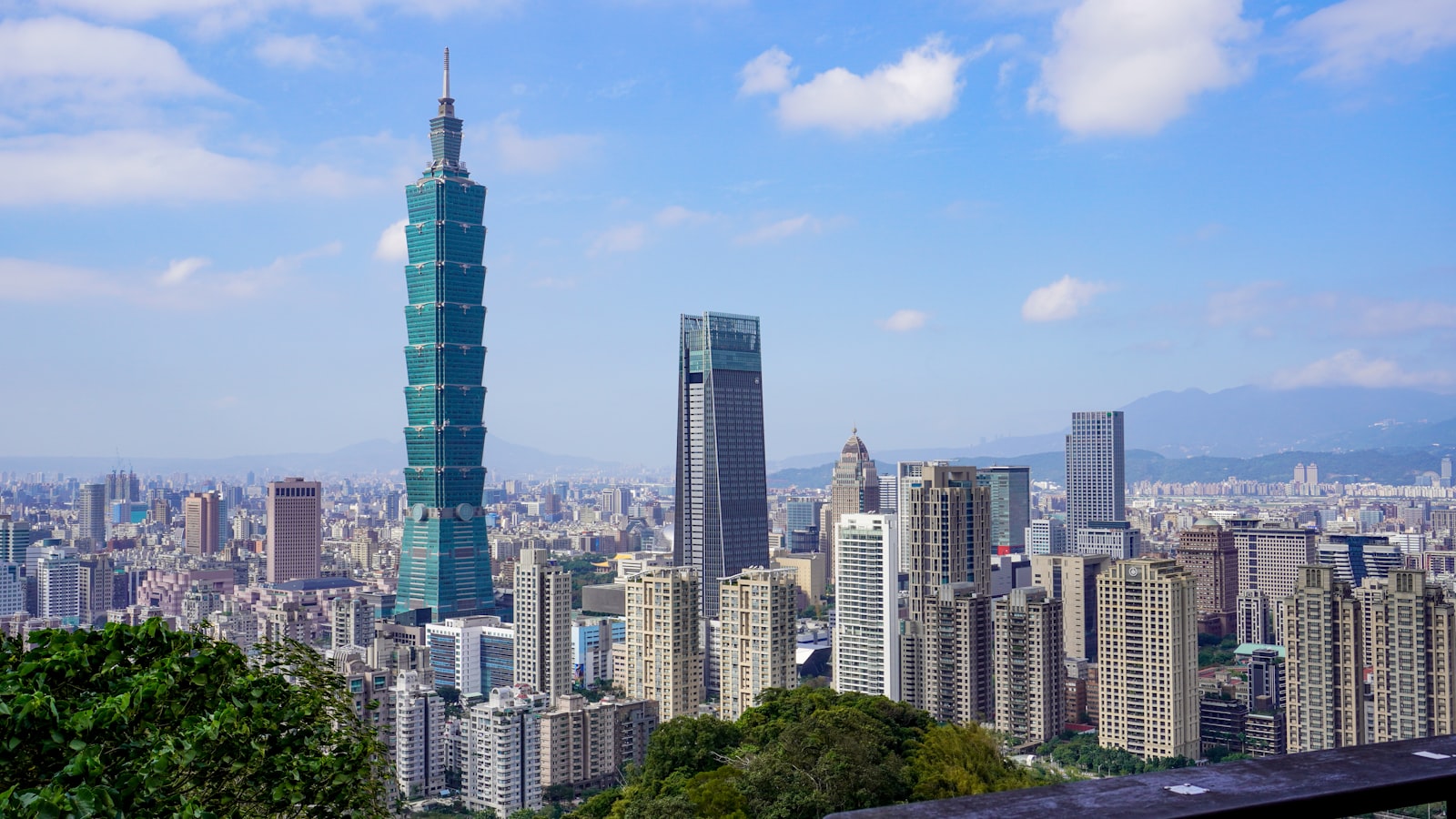 The Taipei city skyline under a blue sky, Taiwan